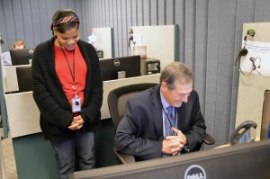 Director John Thompson, takes a turn answering phone calls